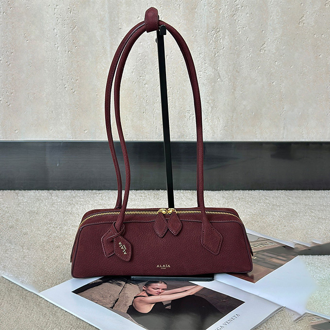 alaïa le teckel long barrel shoulder handbag